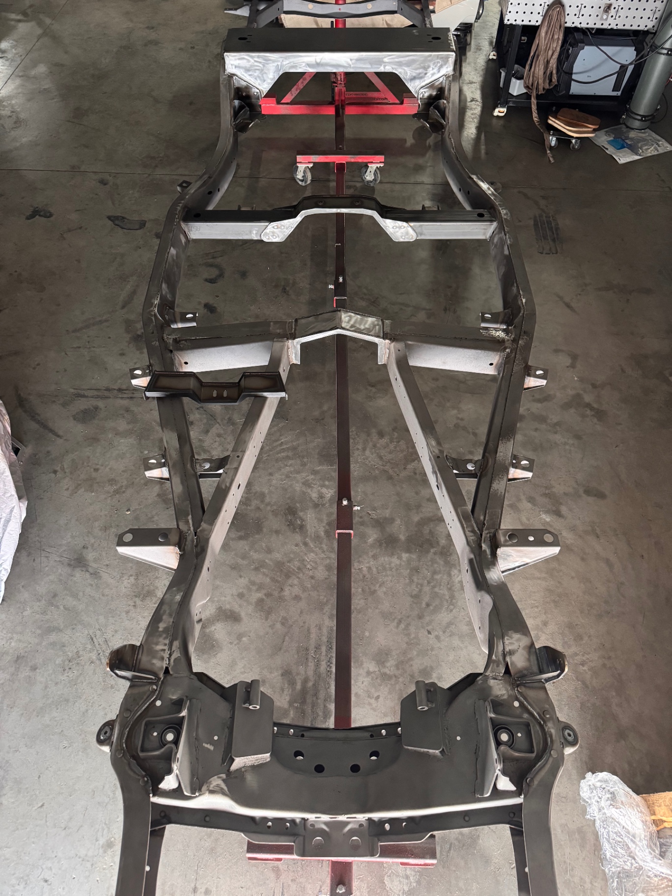 Chassis on the table with Hammer Fab components installed — full overhead view