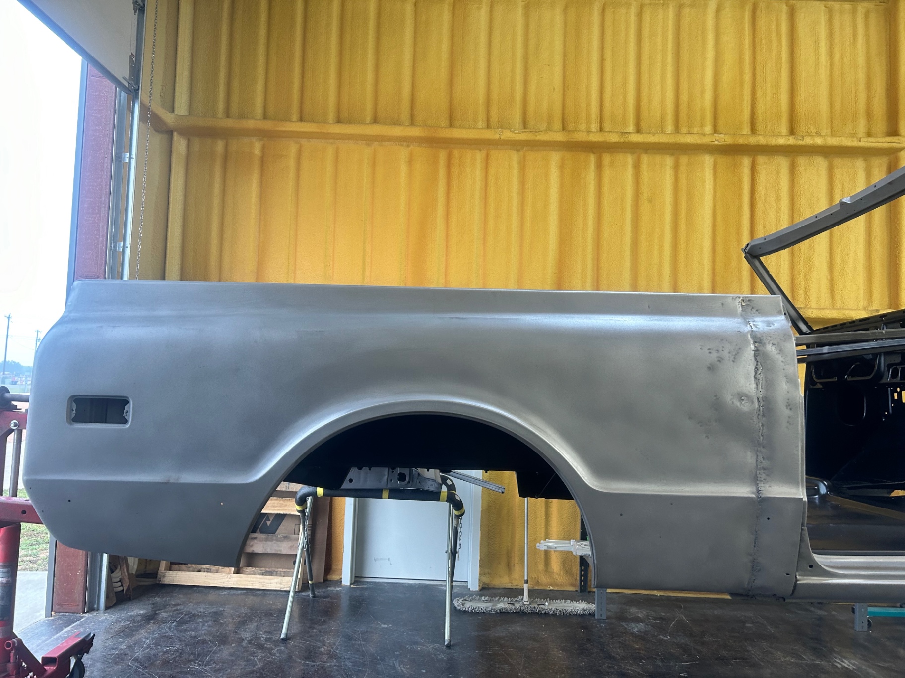 Metal fab, paint, and mockup — frame 5