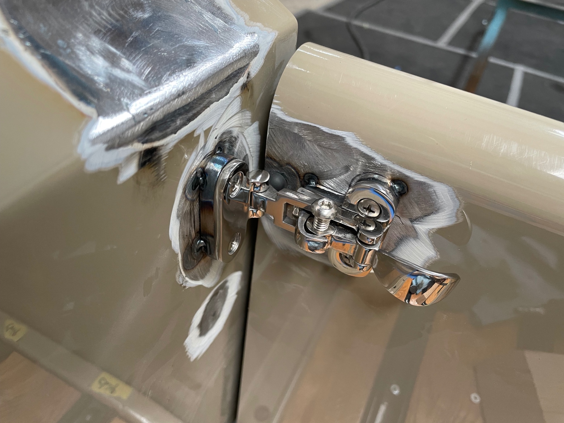 Custom stainless tailgate latch mocked in place.