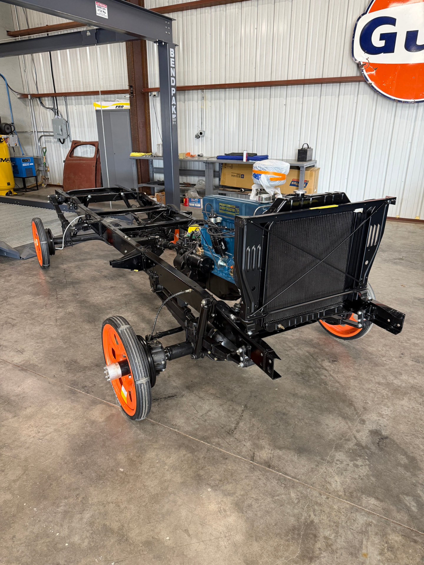 Chassis tucked into dust-free storage while the body goes through paint.