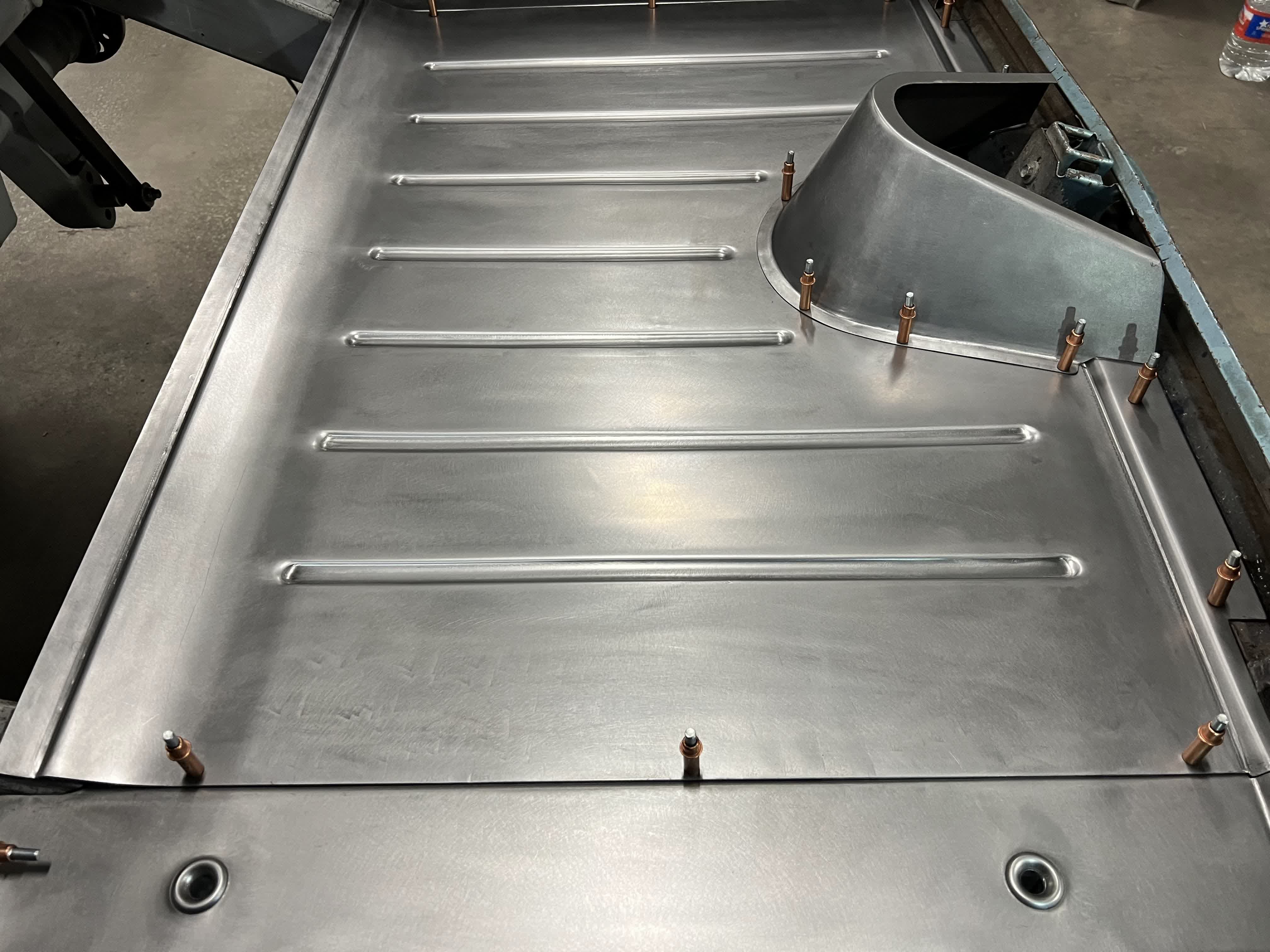 Detail of the beads rolled into a 14ga floor panel on the Pullmax.