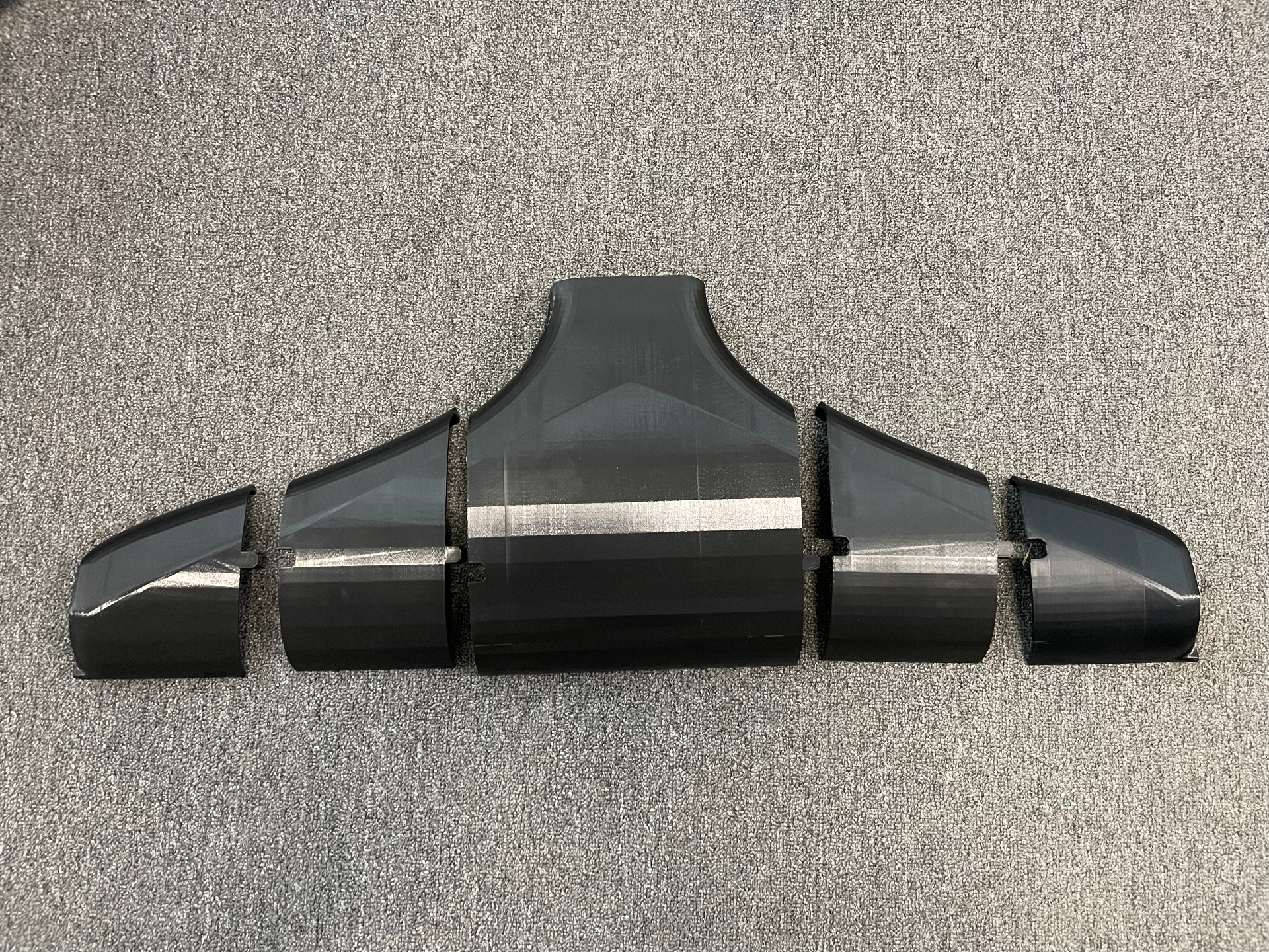 Full-size 3D-printed prototype broken into sections — printed at Hammer Fab to test-fit and flow-check before committing to billet.