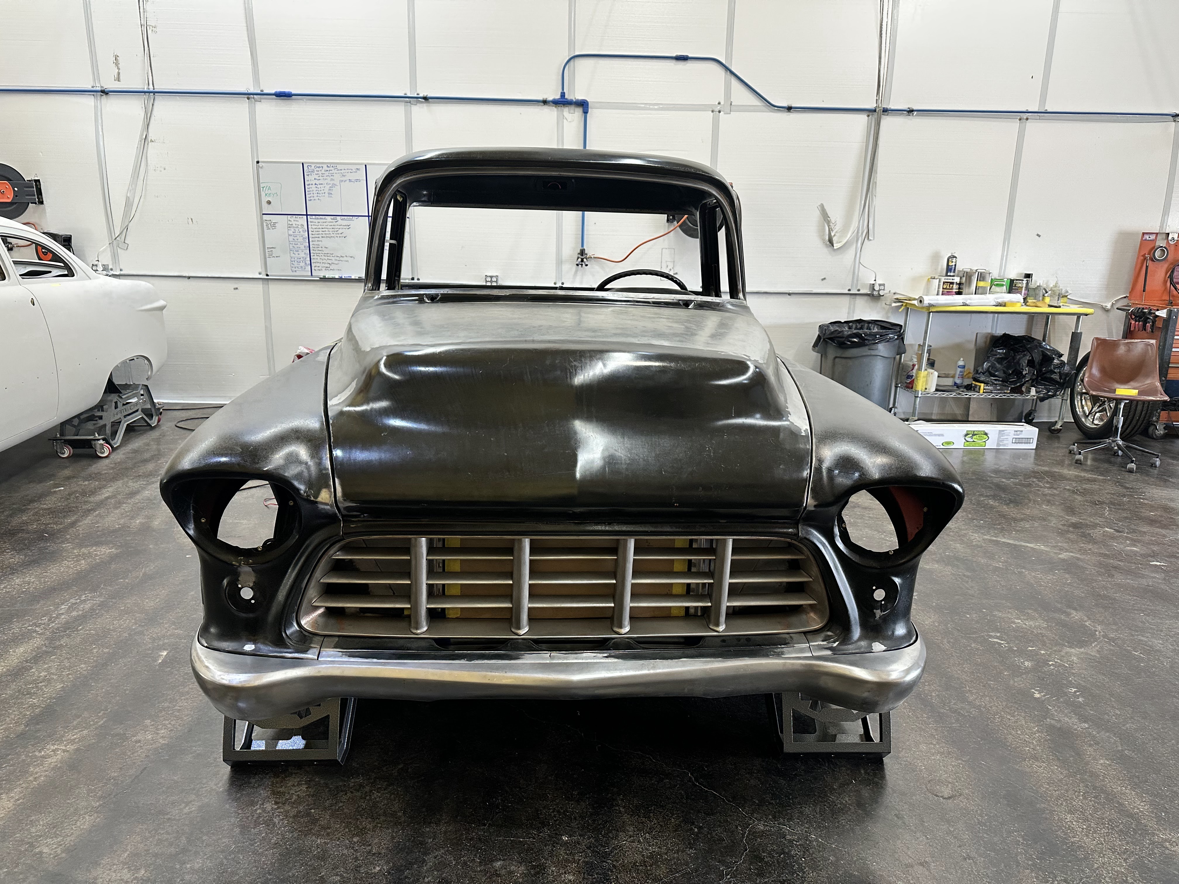 Front end in bare metal during bodywork.