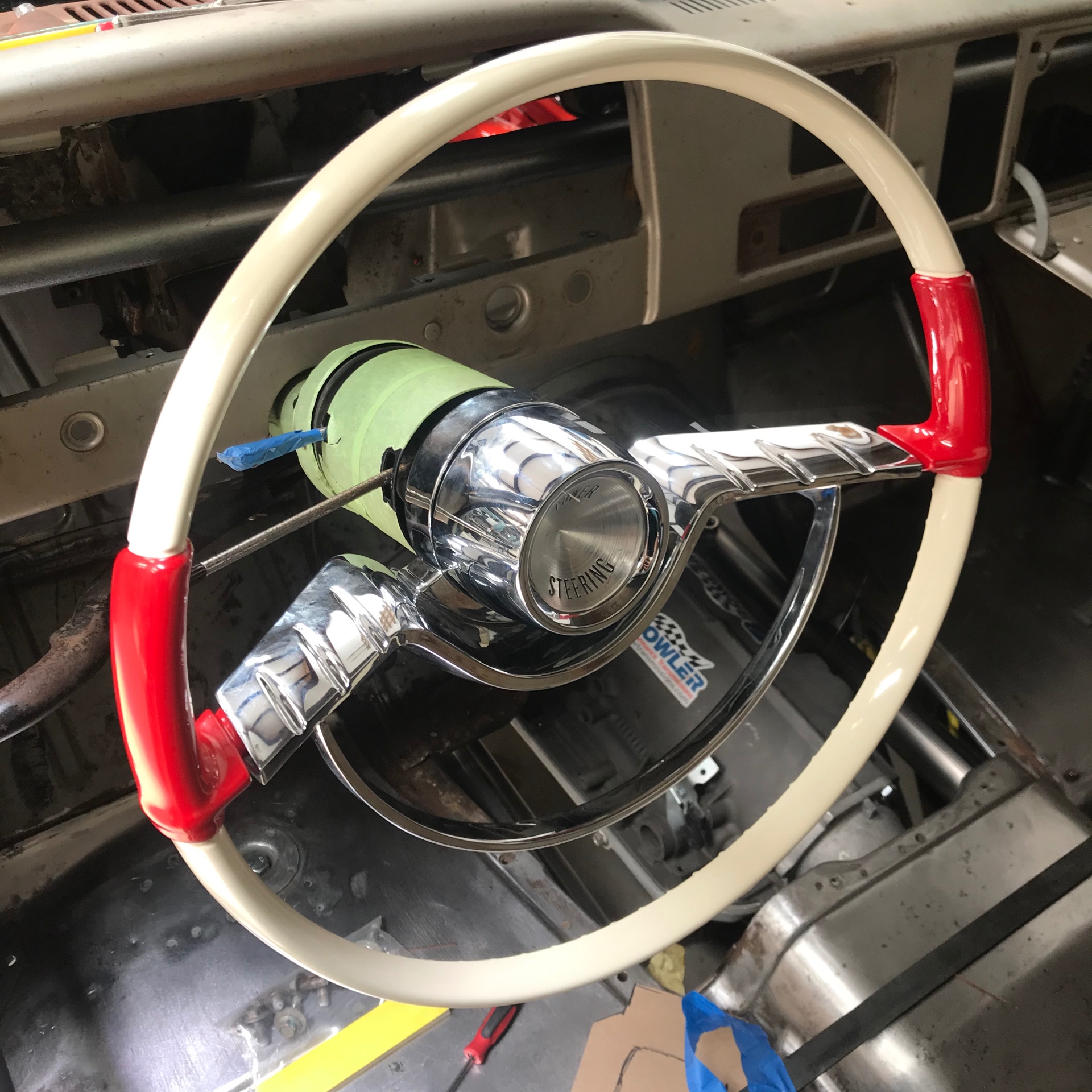 The '58 Plymouth wheel mounted to a GM column — classic look, modern support.