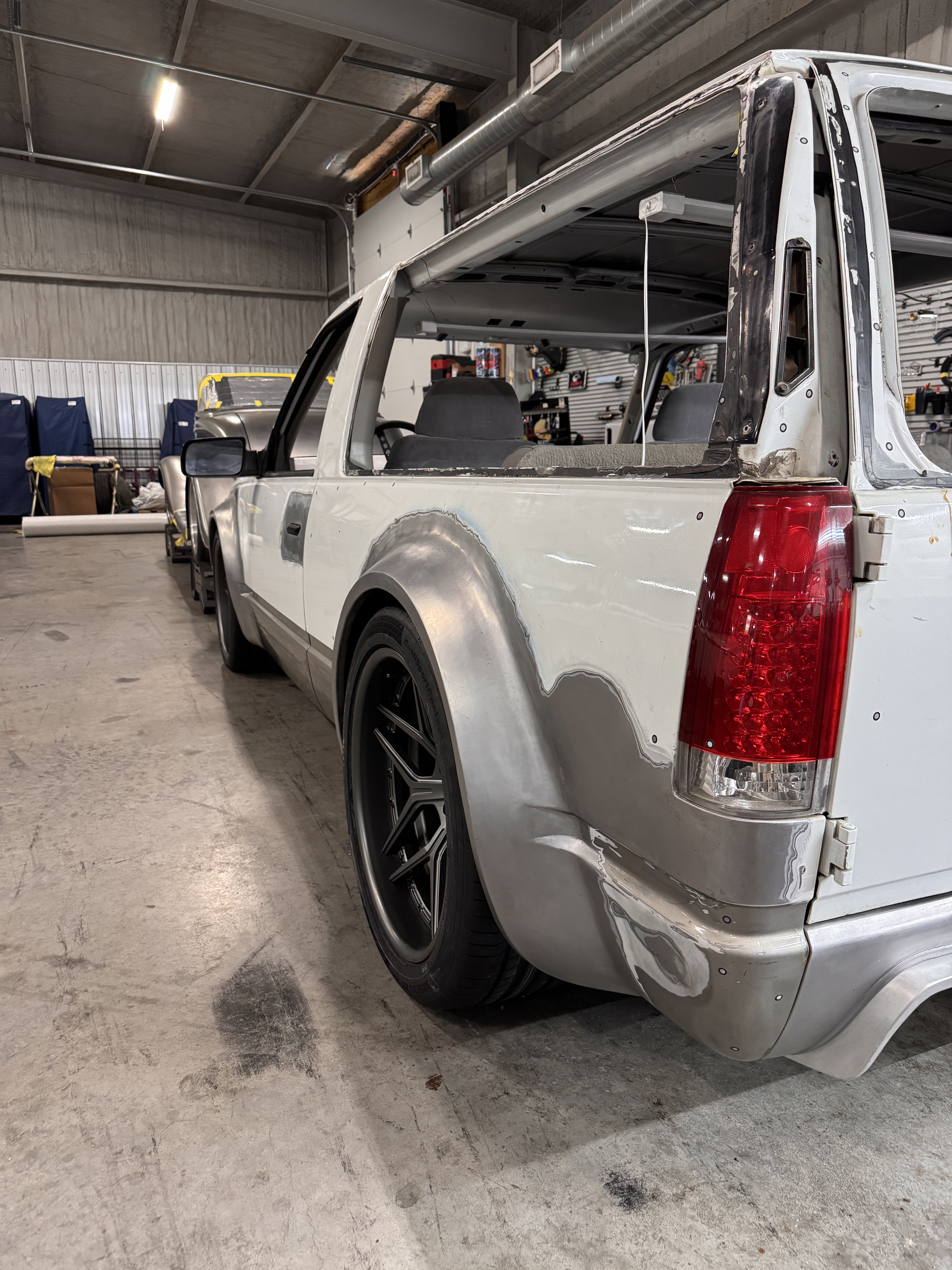 Barn door tailgate and rear flare detail.