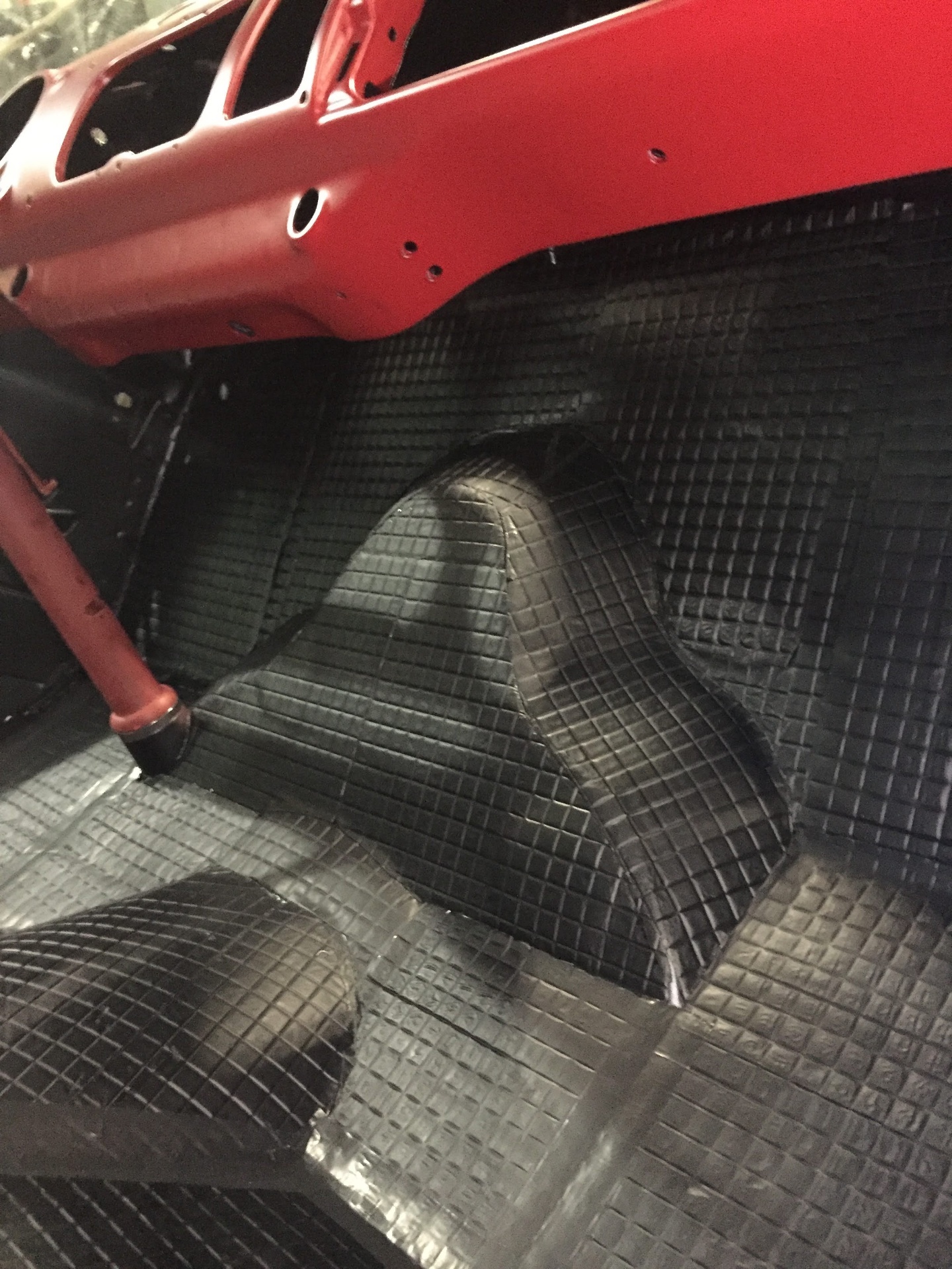 Silent Coat sound and heat barrier laid into the cab floor and transmission tunnel — quiet ride and cooler interior before the carpet ever goes in.